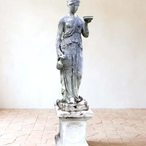 Large statue of Hebe on plinth.