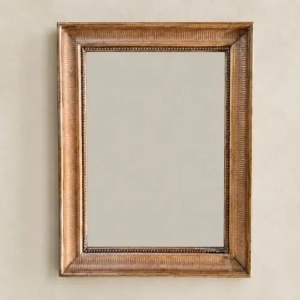 A sweet, gilt framed mirror. French, late 19th/early 20th century.