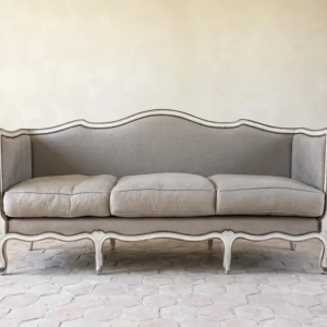 An extremely attractive and desirable Regence style sofa