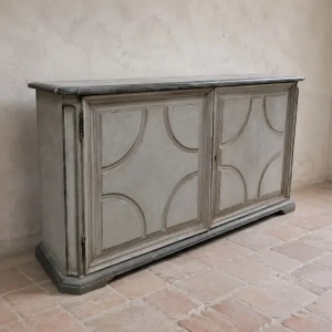 An imposing and rare, two door credenza. Single internal shelf. Solid walnut, later painting and hinges. Genoa, circa 1780.