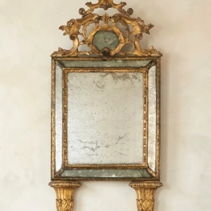 An attractive gilded mirror from the Piedmont region, in the neoclassical style.