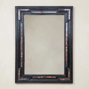 A large and impressive ebonised and faux tortoiseshell mirror, in the Dutch 17th century style. England, late 19th/early 20th century.