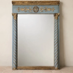 A superb painted overmantel mirror with gilded stucco decoration. Half-column uprights with Corinthian capitals. A frieze of palmettes flanking Apollo's head circled in a wreath of small roses. France, circa 1810.