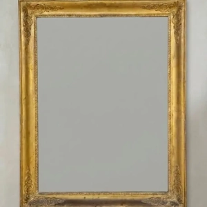 An attractive giltwood mirror. Replacement mirror plate. French Empire period, early 19th century.
