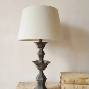 A stylish hexagonal, tiered pewter, vintage lamp from an antique candle stand. Early 20th century.