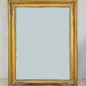 An attractive giltwood mirror. Replacement mirror plate. French Empire period, early 19th century.