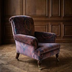 A handsome Edwardian armchair upholstered in Ralph Lauren velvet fabric