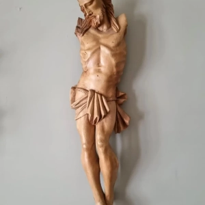 A well carved statue of Christ. Head inclined towards the right shoulder, short loincloth, legs bent, missing arms. France, circa 1750.