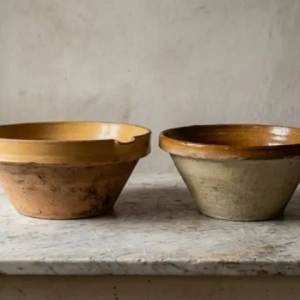 A charming pair of tian bowls from the southwest of France with rustic glazes.