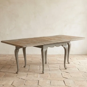 A practical rococo style table.