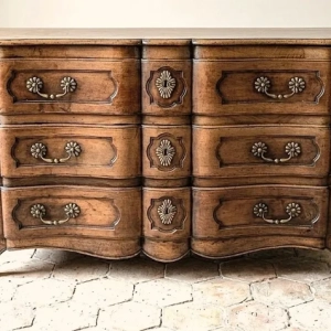 An extremely attractive provincial commode. Three drawers, original handles and escutcheons. South west France, 18th century.